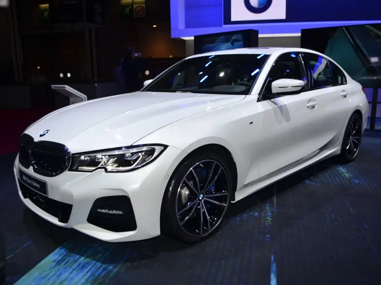 White BMW 3 Series sedan