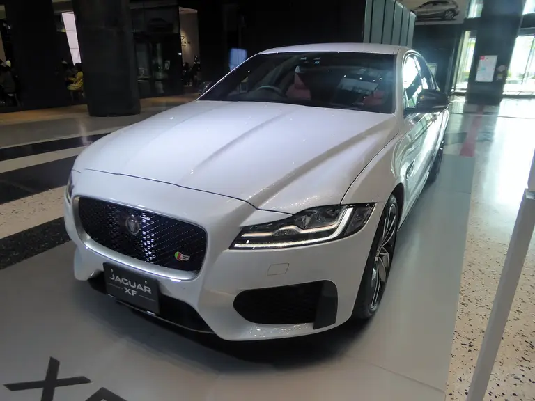 White Jaguar XF sedan, front view