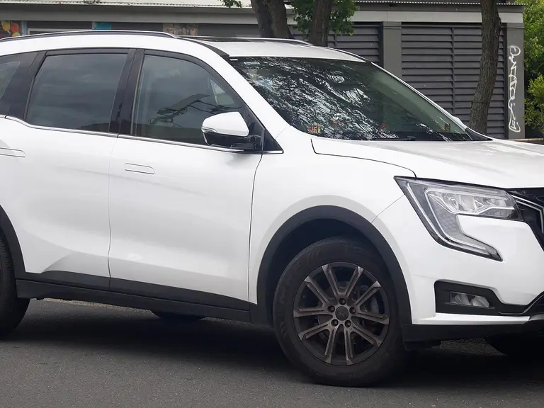 White Mahindra XUV700 parked on a street
